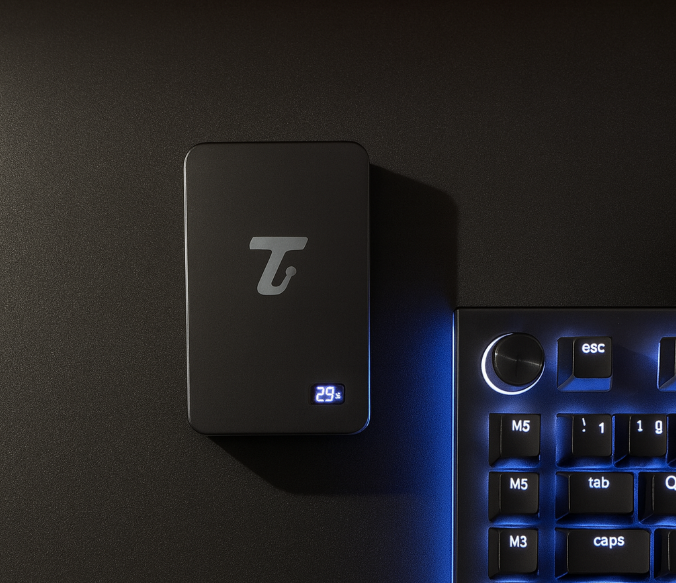 Matte black portable magnetic powerbank with gold logo for fast wireless charging